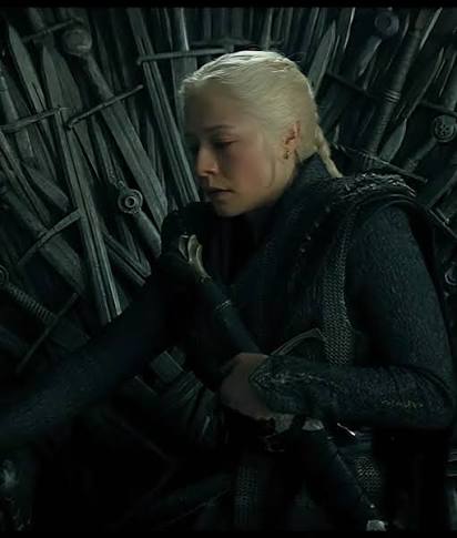 Rhaenyra Targaryen seated on the Iron Throne in House of the Dragon